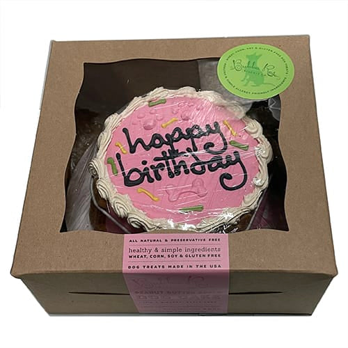 Pink birthday cake with &