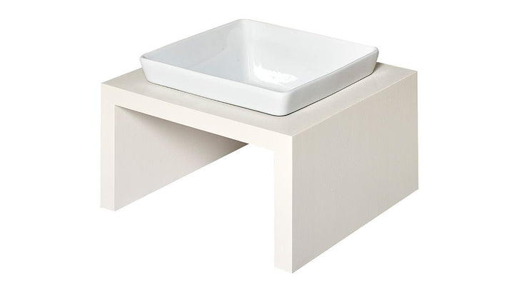 off white dog bowlstand with white square ceramic pet dish