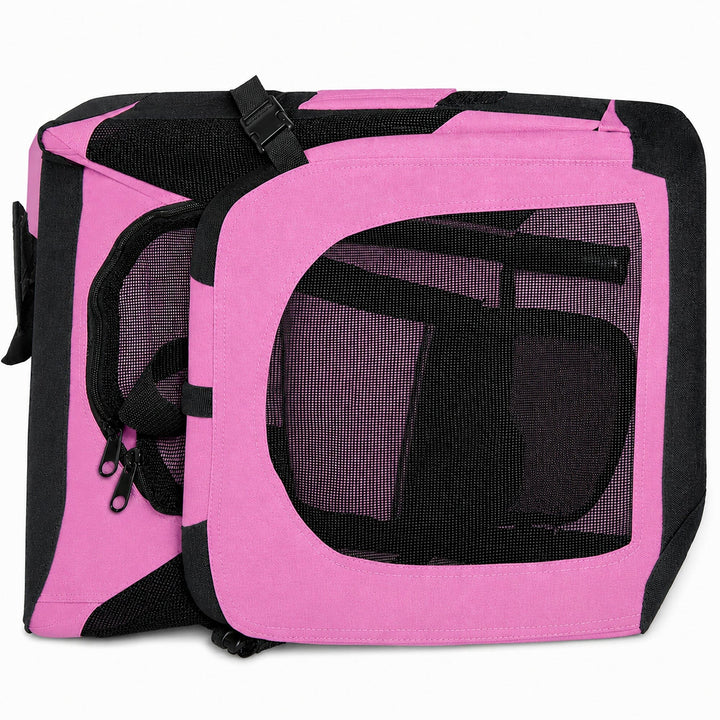 Pink pet carrier with black mesh sides and straps on a white background