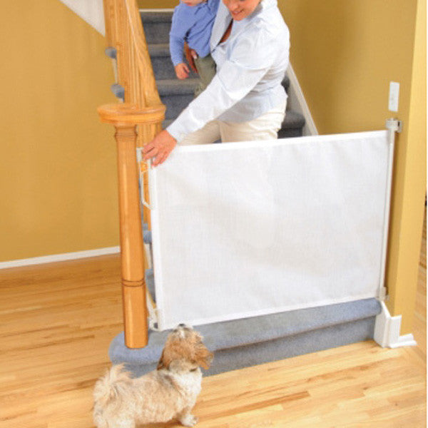 Retractable Pet Gate expands to 55 inches wide
